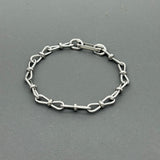 Handcrafted Statement Stainless steel bracelet, interlocking bow bracelet